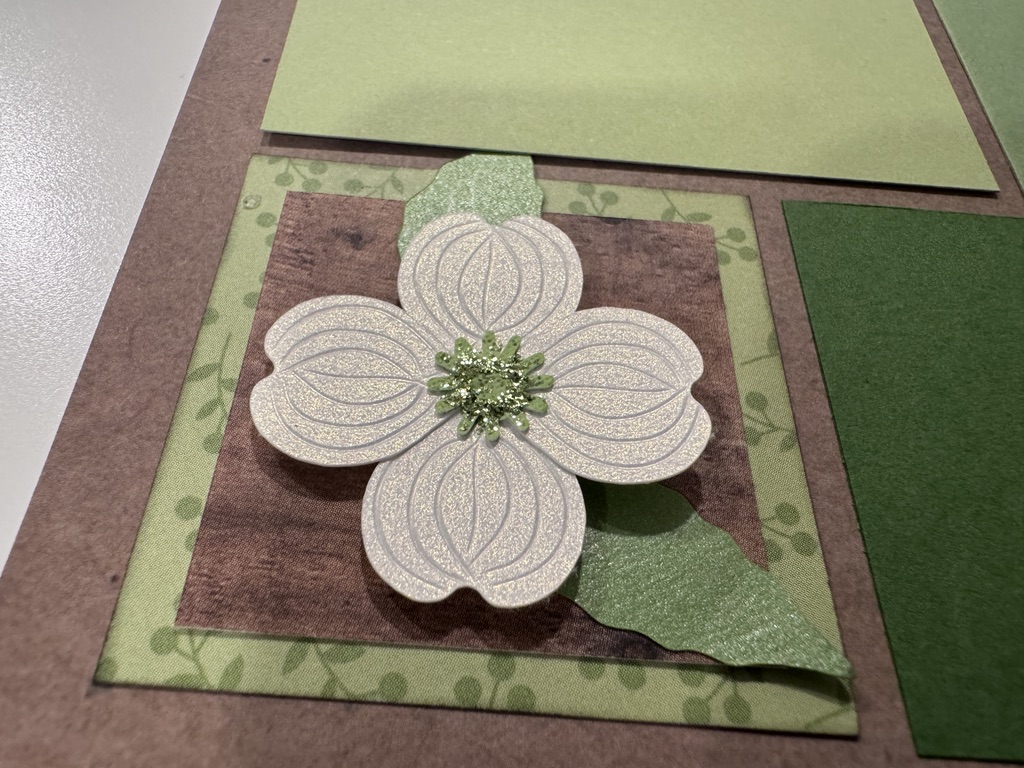 Close-up of a layered handmade white flower embellishment